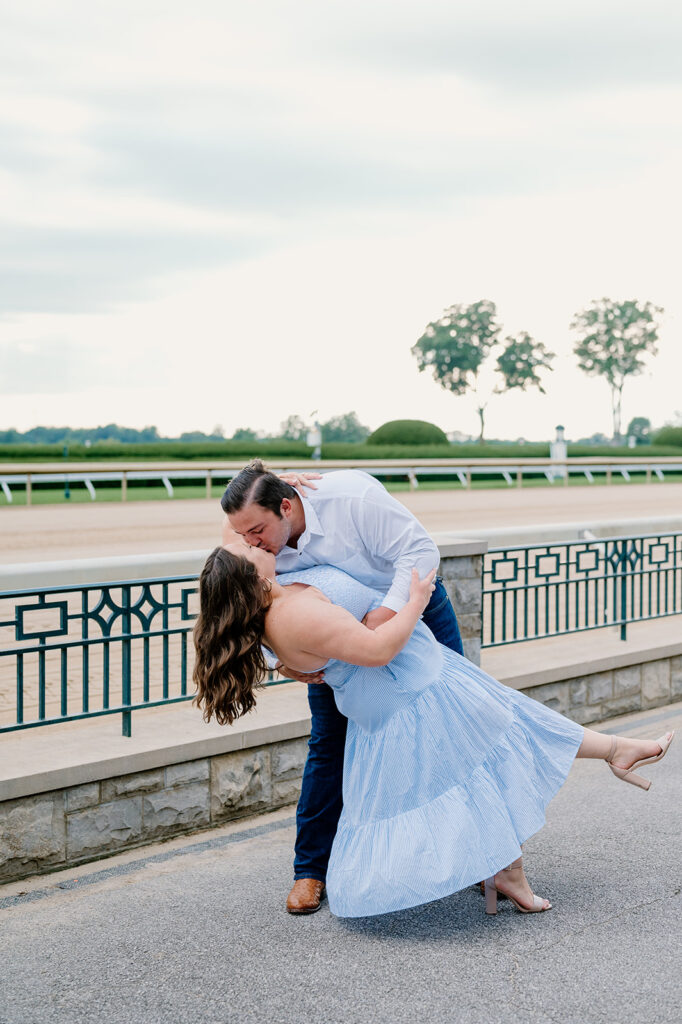 couple kissing at keeneland wedding venue