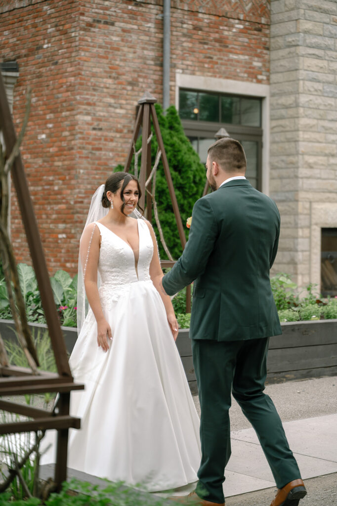Romantic first look between the couple during The Apiary Lexington KY wedding.