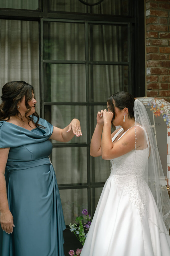 Sisters get emotional during first look inside The Apiary in Lexington KY. 