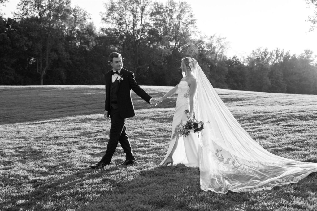 Bride and groom walking the grounds of one of the best country clubs in Lexington, KY. 