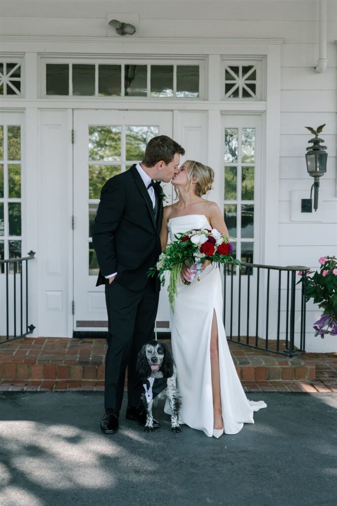 Natural light portraits with bride and groom and their puppy at a Lexington Country Club wedding. 