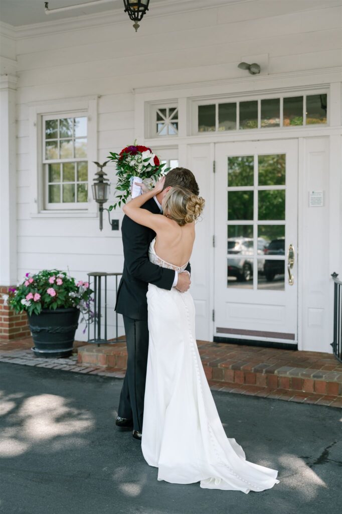 Emotional first look between bride and groom at their country club Lexington, KY wedding. 