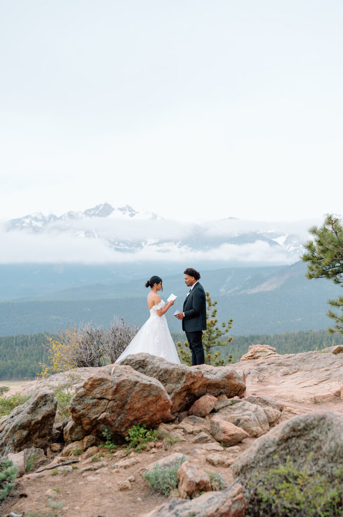 Adventurous mountain elopement photography in Rocky Mountain National Park Colorado.