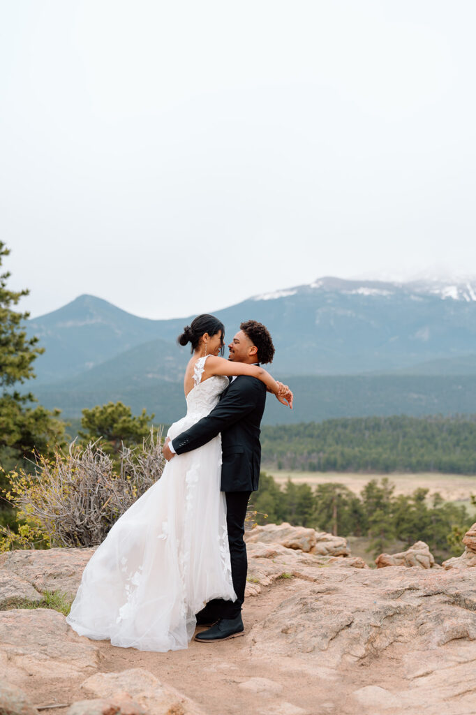Intimate ceremony with mountain scenery in Rocky Mountain National Park.