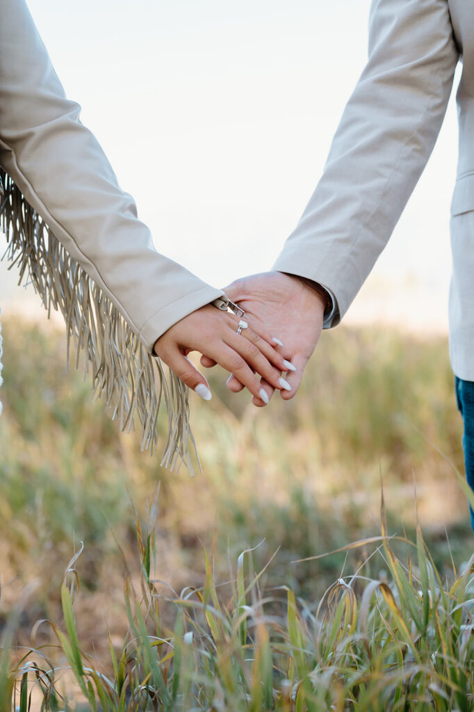 Bride and groom exploring the mountains during their Grand Teton elopement.