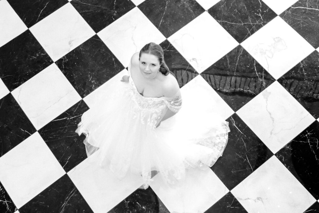 Overhead bridal portrait on the black-and-white dance floor at Hazelnut Farm in Louisville, KY. 
