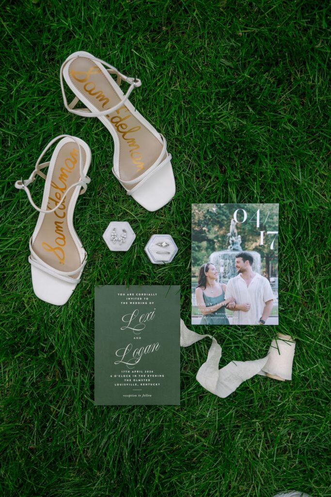 Wedding invitation suite, bridal shoes, rings, and accessories styled for a celebration at one of the historic wedding venues Louisville KY offers. 