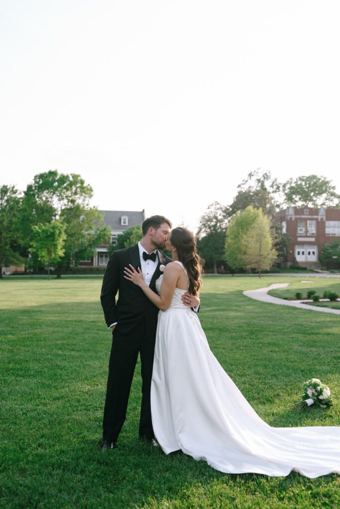 The Olmsted photos of the newlyweds sharing a romantic kiss during golden hour portraits.