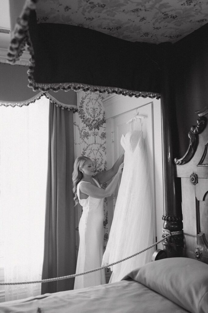 Bride getting her dress ready for the big day at Whitehall wedding venue.