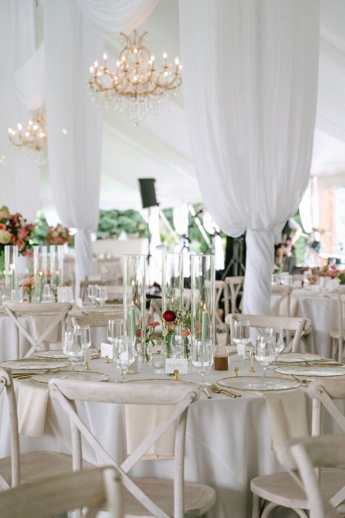 Elegant tables with chandeliers above for a reception at Whitehall wedding venue.